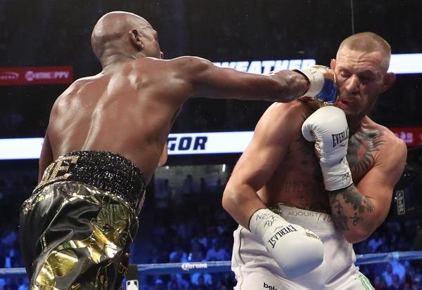 Floyd Mayweather gana la