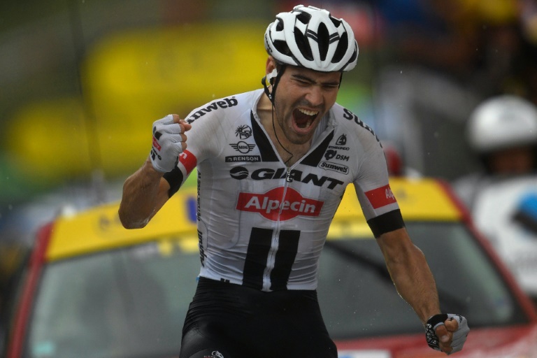El ciclista holandés Tom Dumoulin cruza como vencedor la meta de la novena etpa del Tour de Francia el 10 de julio de 2016 en Arcalís (Andorra) / AFP / Lionel Bonaventure